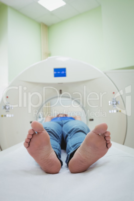 A patient is loaded into an mri machine