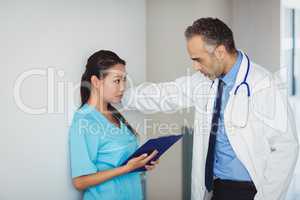 Doctor interacting with nurse