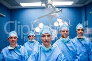 Portrait of surgeons standing in operation room