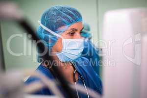 Surgeon using monitor