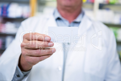 Pharmacist holding a prescription