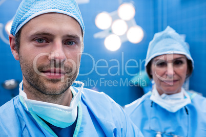 Portrait of surgeons standing in operation room