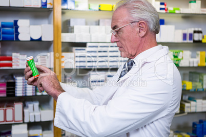 Pharmacist checking medicines