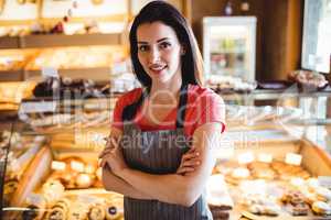 Portrait of female baker smiling