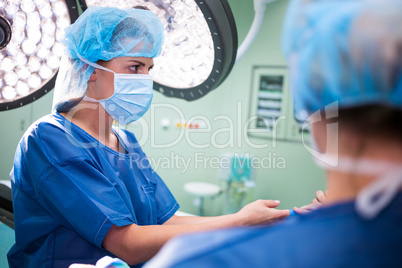 Female surgeon in operation room