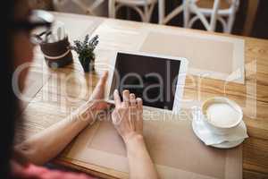 Woman using digital tablet