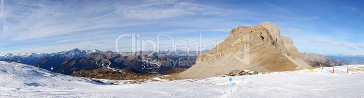 The panorama of ski slope and skiers at Passo Groste ski area, M