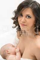 Portrait of mother's face during breastfeeding