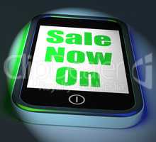 Sale Now On Phone Displays Promotional Savings Or Discounts