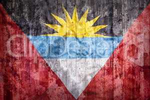 Grunge style of Antigua and Barbuda flag on a brick wall