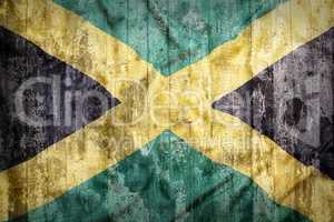 Grunge style of Jamaica flag on a brick wall