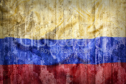 Grunge style of Colombia flag on a brick wall