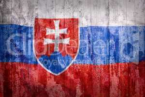 Grunge style of Slovakia flag on a brick wall
