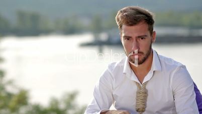 Businessman adjusting a noose rope like tie