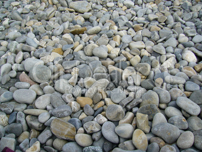 Texture of pebbles from a beach shore