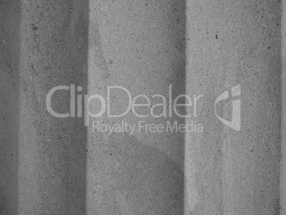 Yellow stone column in black and white
