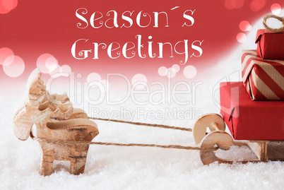 Reindeer With Sled, Red Background, Text Seasons Greetings