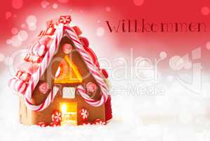 Gingerbread House, Red Background, Text Willkommen Means Welcome