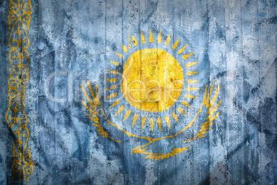 Grunge style of Kazakhstan flag on a brick wall