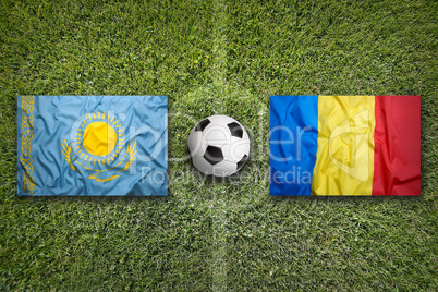 Kazakhstan vs. Romania flags on soccer field