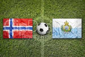 Norway vs. San Marino flags on soccer field