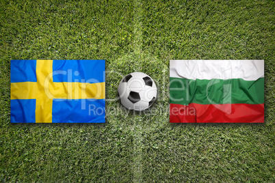 Sweden vs. Bulgaria flags on soccer field