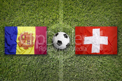 Andorra vs. Switzerland flags on soccer field
