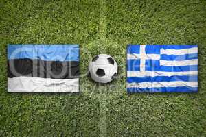 Estonia vs. Greece flags on soccer field