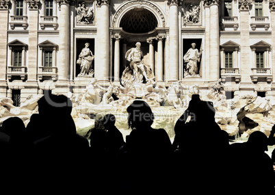 Trevi fountain and tourists shooting