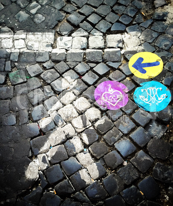 Cobblstone street with colored indications