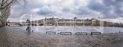 The Seine River and its shore on a rainy day