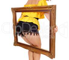 Woman's butt in picture frame.