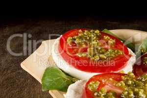 Caprese salad with mozzarella cheese tomatoes and basil