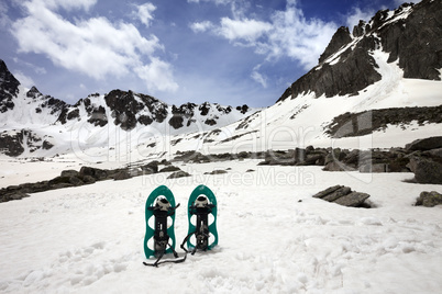 Snowshoes in snow mountain