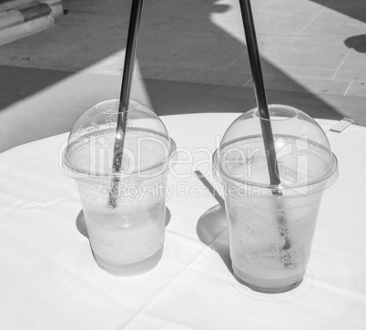 Cocktail glasses on a table in black and white