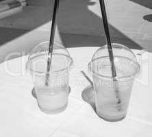 Cocktail glasses on a table in black and white