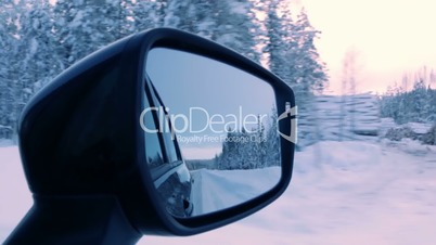 Empty Winter Road in the Rear View Mirror