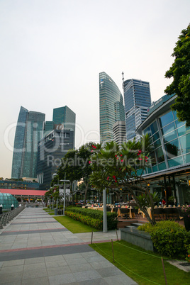 Evening view of Singapore. Beautiful skyscrapers and gold lights.