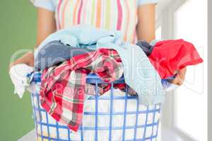 Composite image of full laundry basket