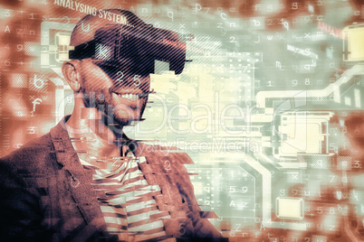 Composite image of man wearing virtual simulator headset