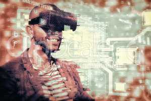Composite image of man wearing virtual simulator headset