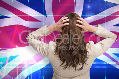 Composite image of young classy businesswoman with hands on head standing back to camera