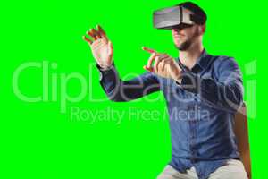Composite image of man wearing virtual reality headset