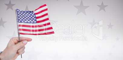 Digital image of hand holding American flag