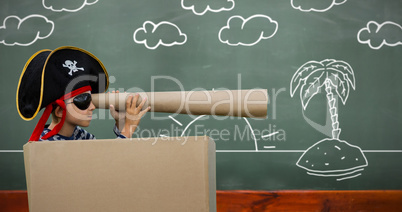 Composite image of boy pretending to be a pirate