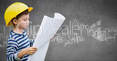 Composite image of boy in hard hat reading a plan