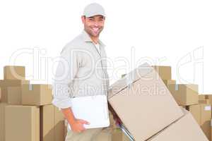 Composite image of delivery man pushing trolley of boxes on white background