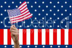 Digital composite of hand holding flag