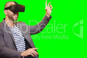 Composite image of man with virtual reality simulator