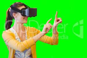 Composite image of woman using a virtual reality device